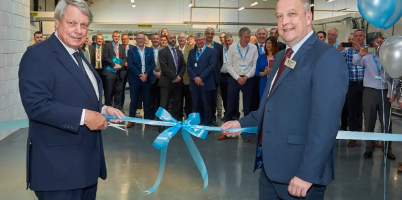Ribbon cutting by Paul Dupee & Terry Allison