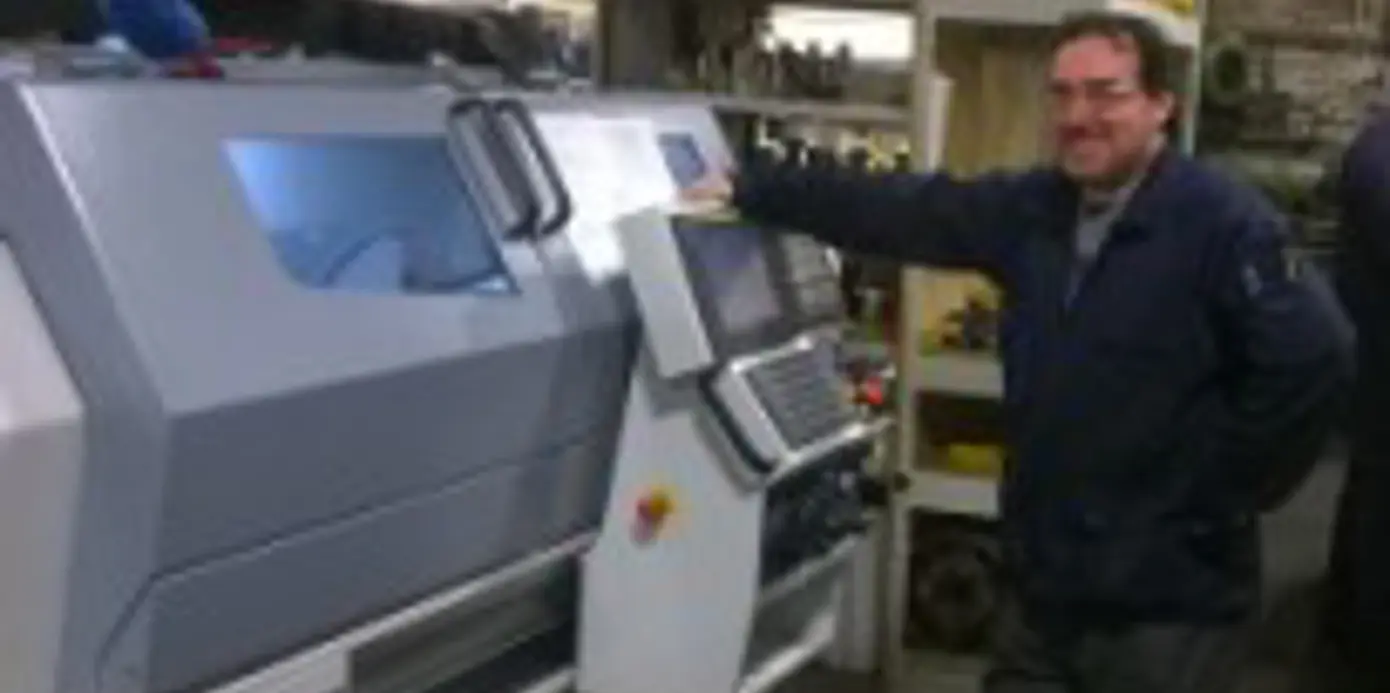 Ian Salter, Director of Precision Components Manufacturing Limited with his new Harrison Alpha 1400XS manual/cnc lathe Ian Salter, Director of Precision Components Manufacturing Limited with his new Harrison Alpha 1400XS manual/cnc lathe
