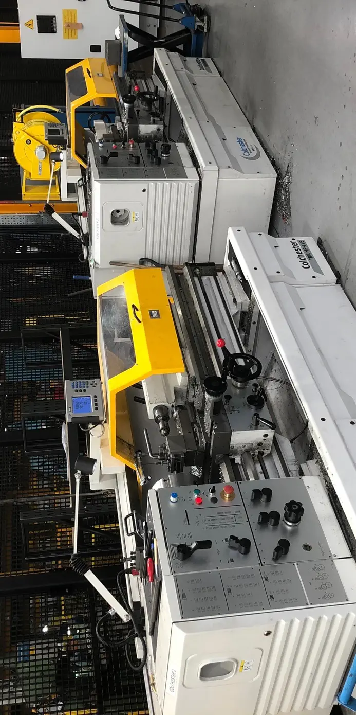 Two Colchester Triumph machines side by side Two Colchester Triumph machines side by side