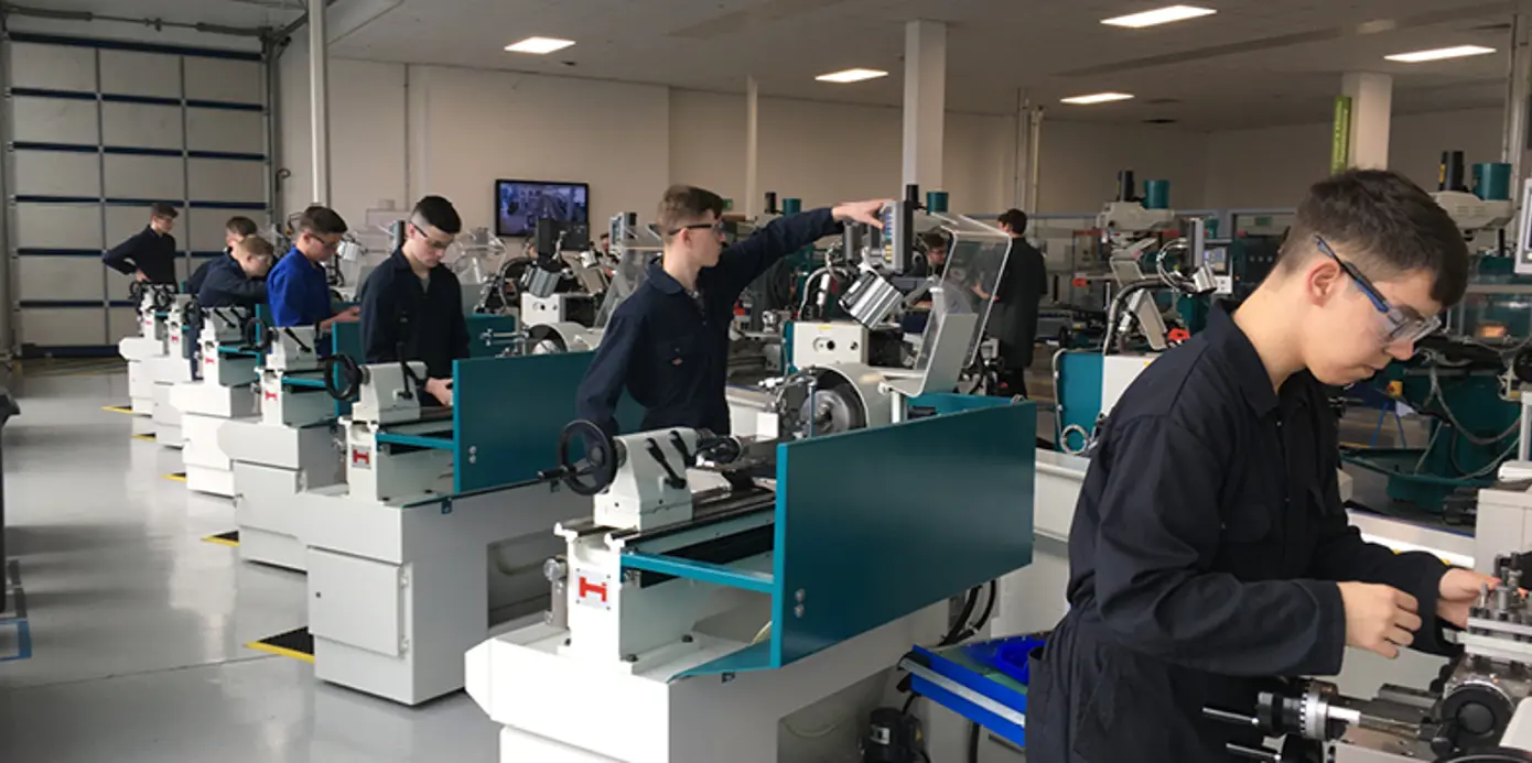 Seven students working on Colchester Student lathes Seven students working on Colchester Student lathes